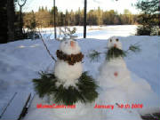 A pair of January Snowmen